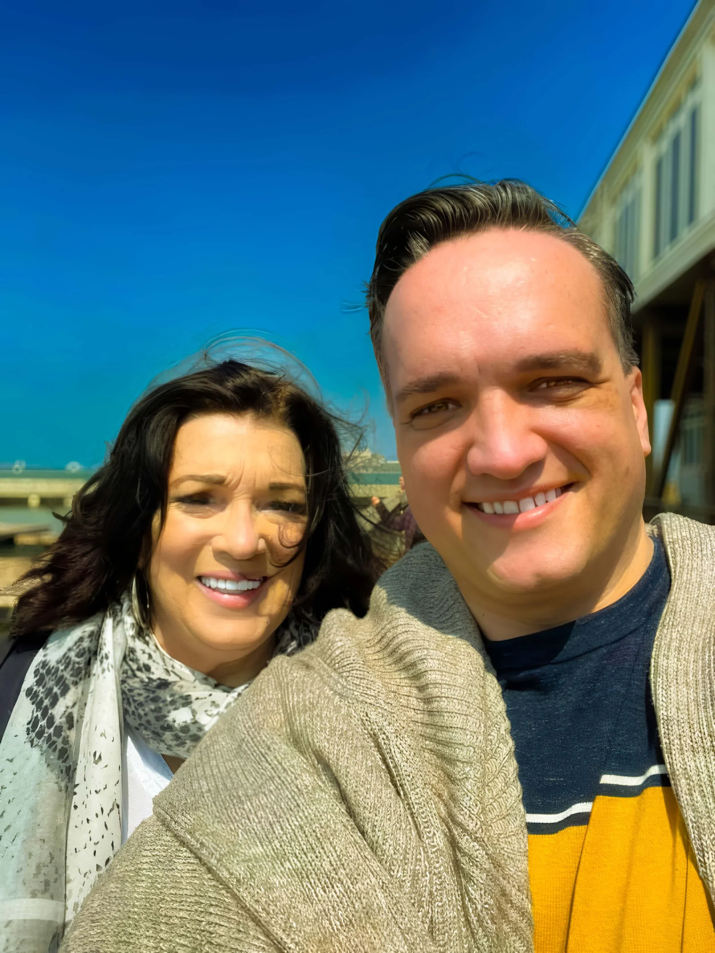 Caleb Mills Stewart and his mother, Robyn Stewart, smiling together in a sunny outdoor selfie.